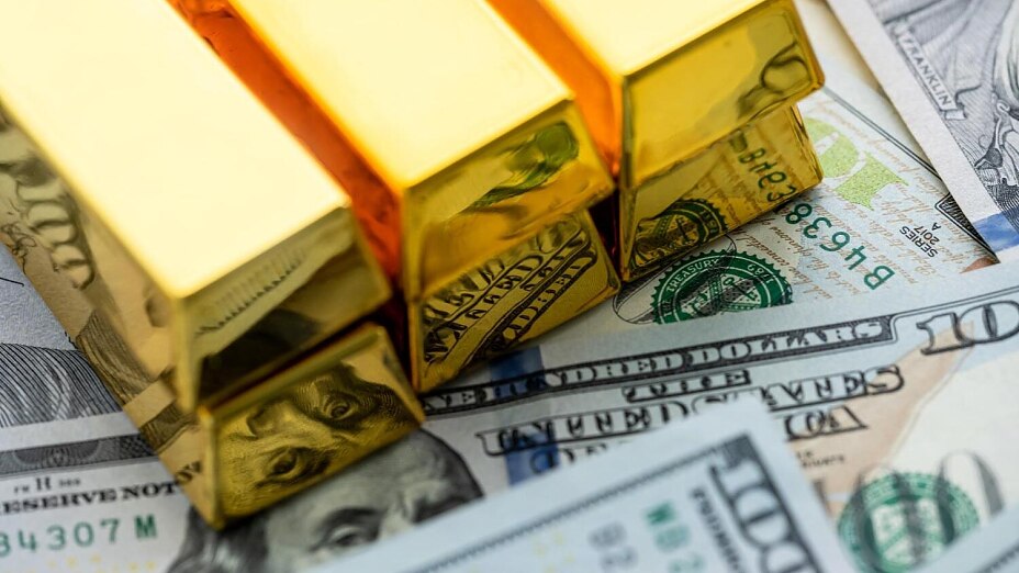 Goldankauf Berlin - Goldbarren und Geld